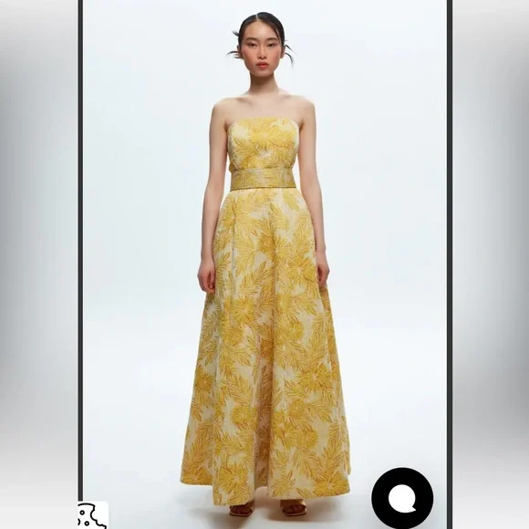 Yellow jacquard strapless gown